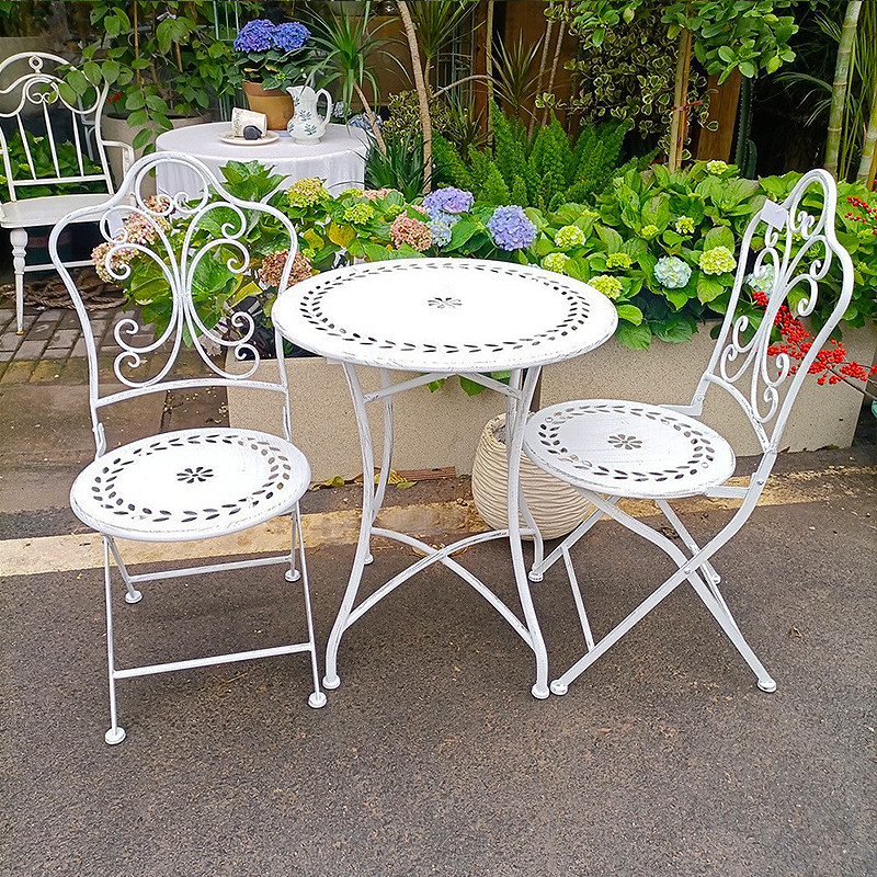 طاولة وكراسي حديدية على الطراز - مراجعة Outdoor Furniture Iron وسعره